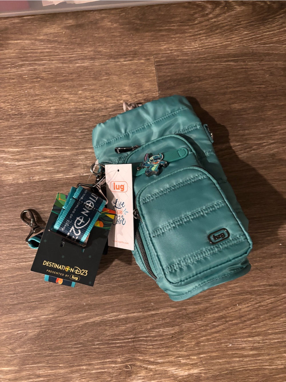 Destination D23 lug Teal Quilted Crossbody Water BoyBag with Strap Huggie
